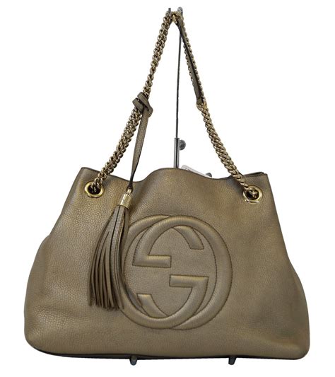 gucci tote with chain handles.